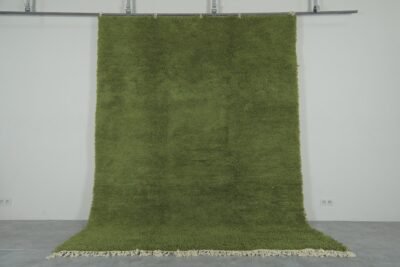 traditional Moroccan olive green Beni Ourain rug, highlighting fine Berber craftsmanship and thick, soft wool. Ideal for cozy living spaces and minimalist interiors.