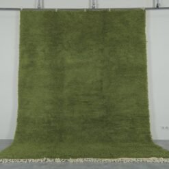 traditional Moroccan olive green Beni Ourain rug, highlighting fine Berber craftsmanship and thick, soft wool. Ideal for cozy living spaces and minimalist interiors.