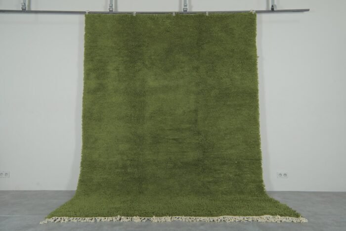 traditional Moroccan olive green Beni Ourain rug, highlighting fine Berber craftsmanship and thick, soft wool. Ideal for cozy living spaces and minimalist interiors.