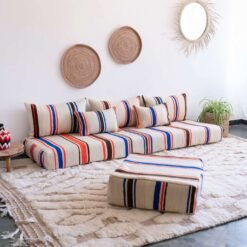 Bohemian-style living space with Moroccan striped floor sofa