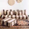 Handmade Moroccan floor couch covers in ivory with brown Berber stripes, unstuffed wool cushions with zippered openings