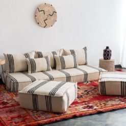 Cozy living space styled with Moroccan cream and black cushions