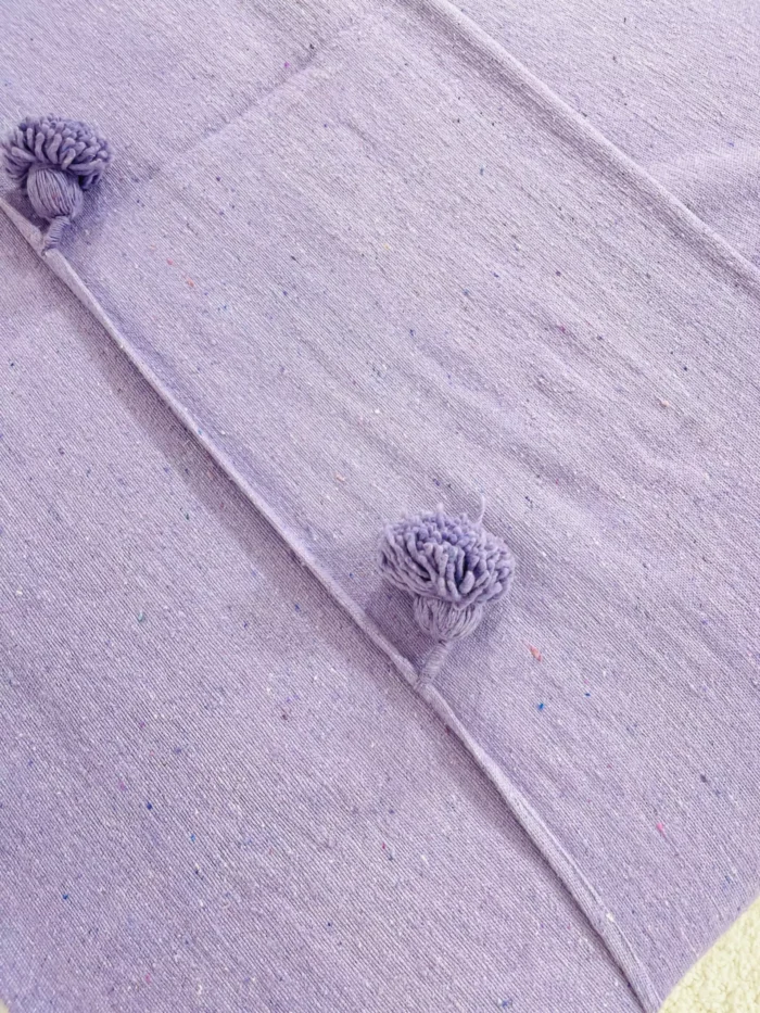 Purple Moroccan blanket in natural light showing cotton texture