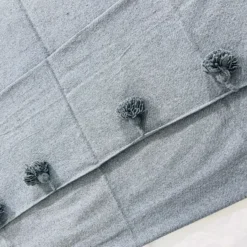 Close-up of woven cotton fabric in grey color