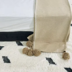 Beige cotton blanket with Moroccan-style home decor accents
