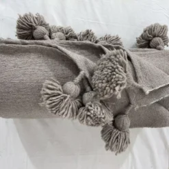 Taupe cotton throw styled