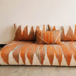 Bohemian Moroccan floor seating set in orange and ivory tones
