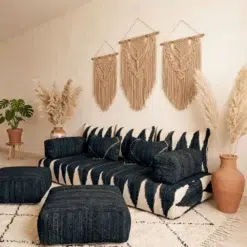 Handwoven black wool floor sofa covers with ivory geometric patterns and matching modular cushions