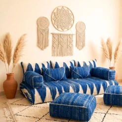 Blue Moroccan floor sofa covers with back pillows, armrests and matching floor poufs
