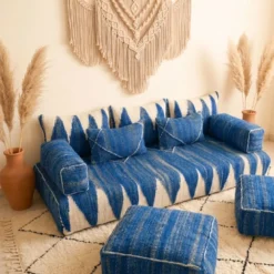 Blue wool Moroccan floor sofa cover set with ivory patterns, pillows and matching poufs