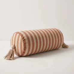 Brown and cream striped cylinder bolster pillow cover with tassels
