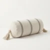 Cream and black striped cylindrical bolster pillow cover with tassels