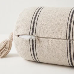 Cream and black striped bolster pillow cover with zipper closure
