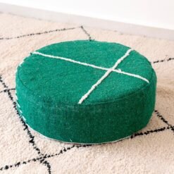Green round cotton pouf with intersecting ivory lines